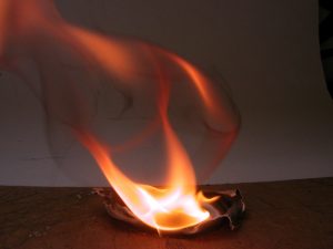 Burning on table Charlotte Injury Law Firm